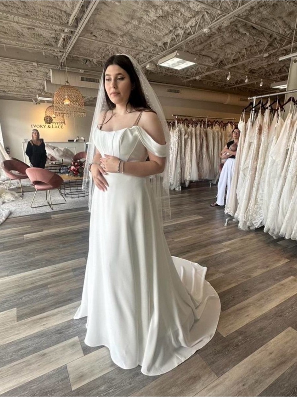 Elegant Off-Shoulder White Bridal Gown with Veil